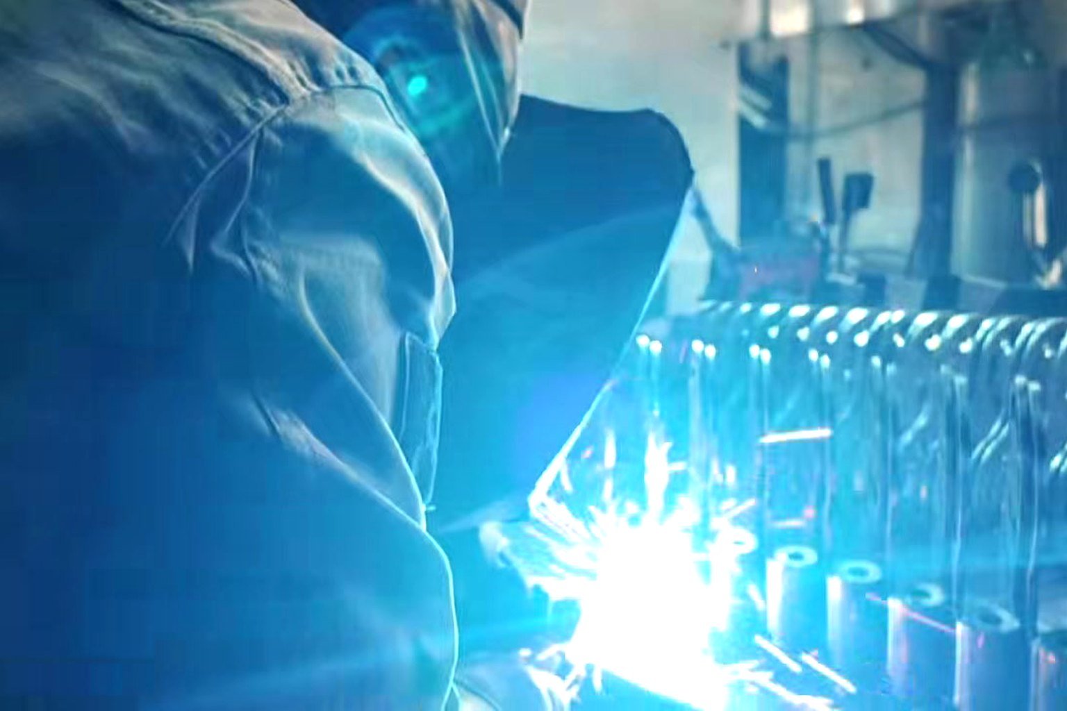 Welding a commercial gym equipment frame at the Dongli factory